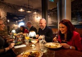 Diners are pictured enjoying dinner at the award-winning Blackrock Cottage in Salthill.